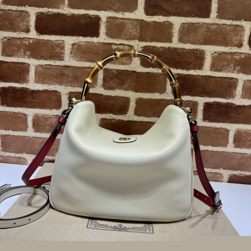 G*u*i top handle bags
